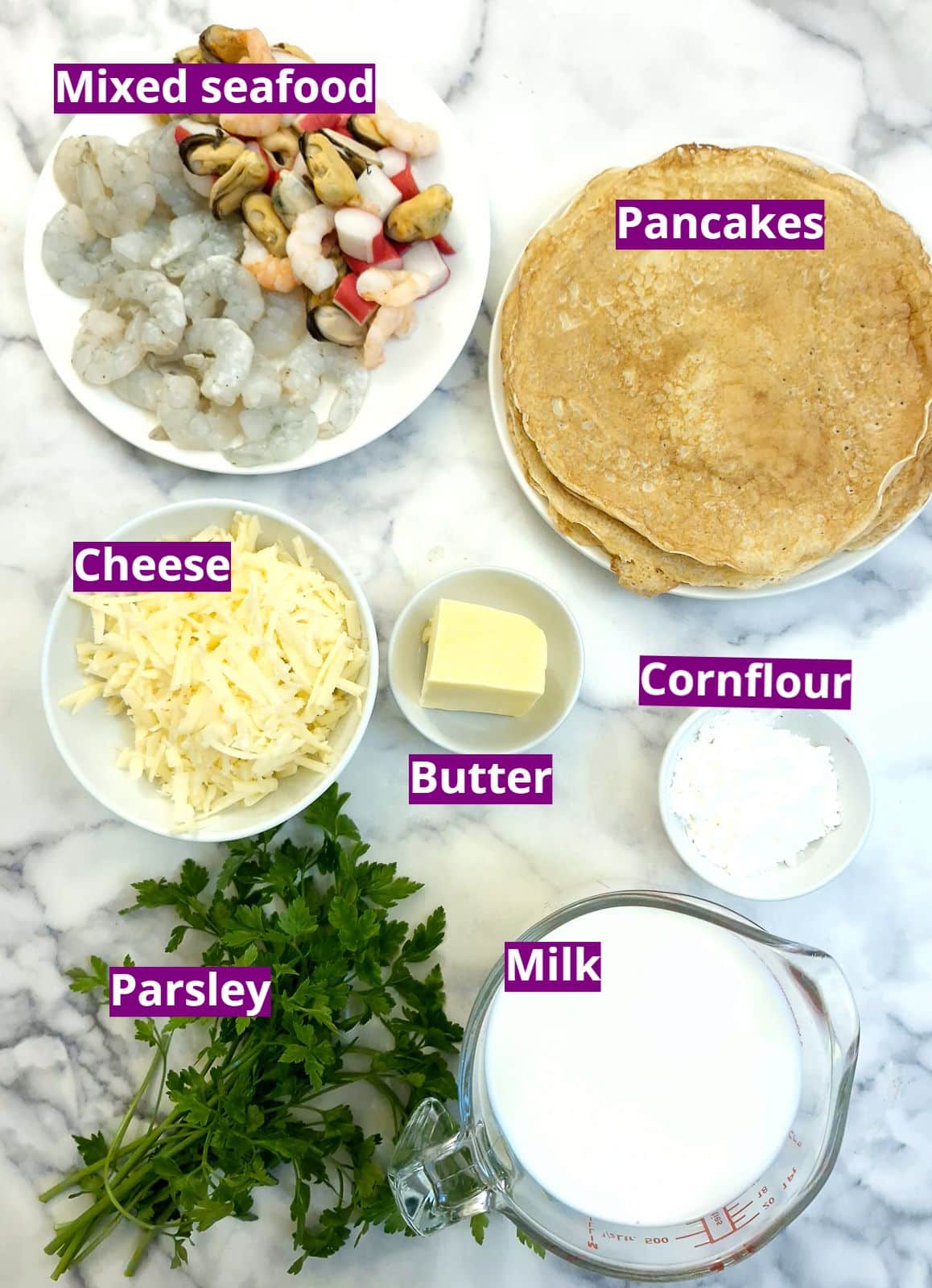 Ingredients for making seafood stuffed pancakes.