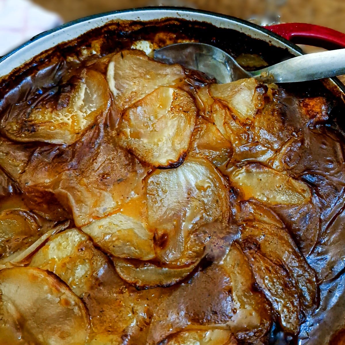 Close of of soft potatoes on top of the steak and kidney hotpot.