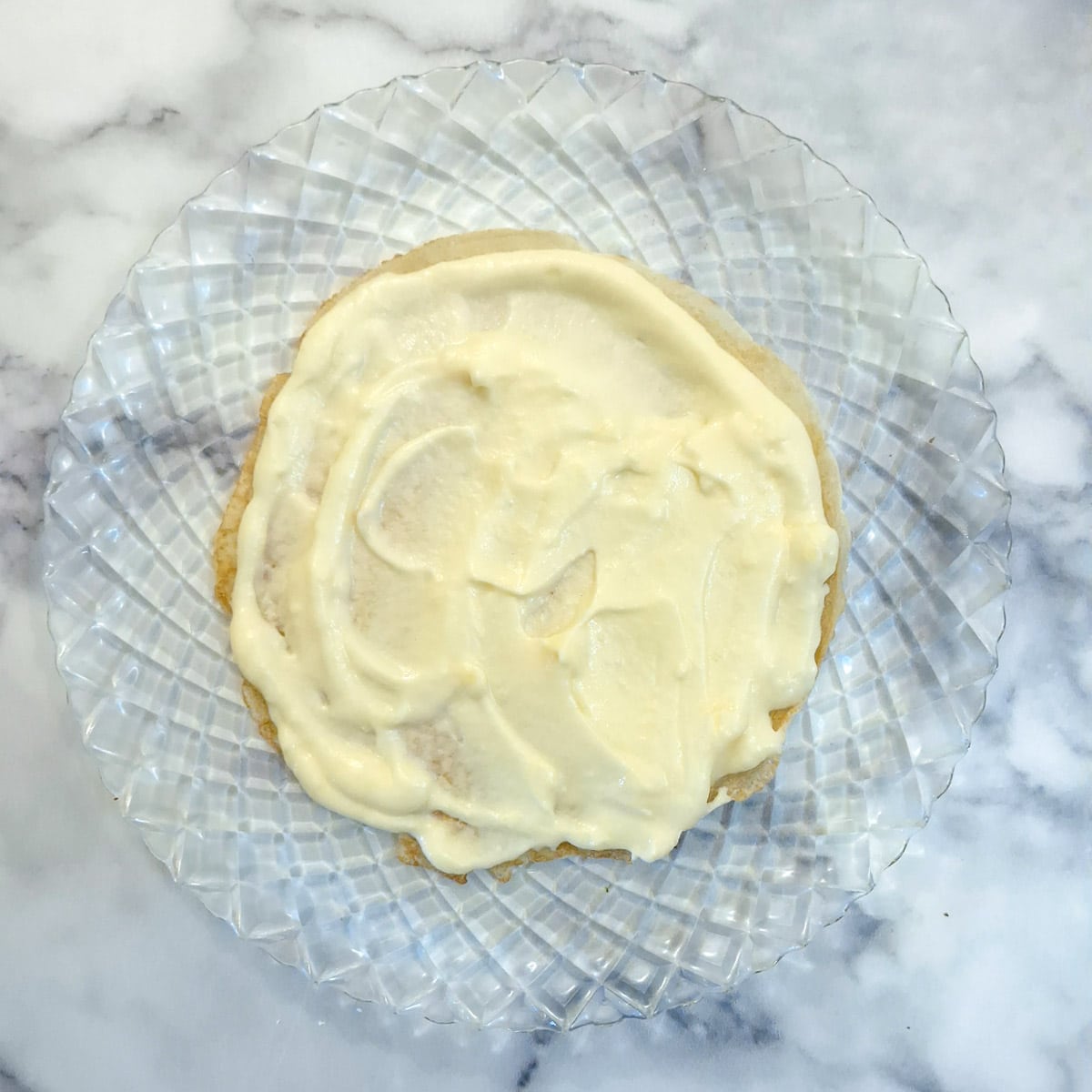 Custard spread on a pancake.