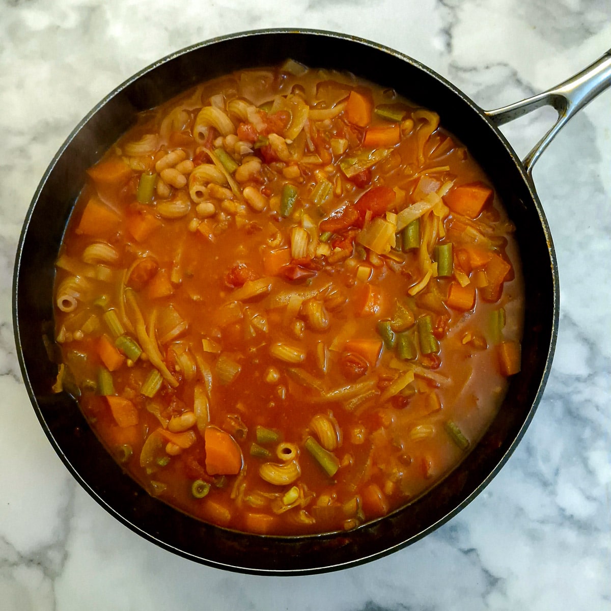 Pasta added to the minestrone.
