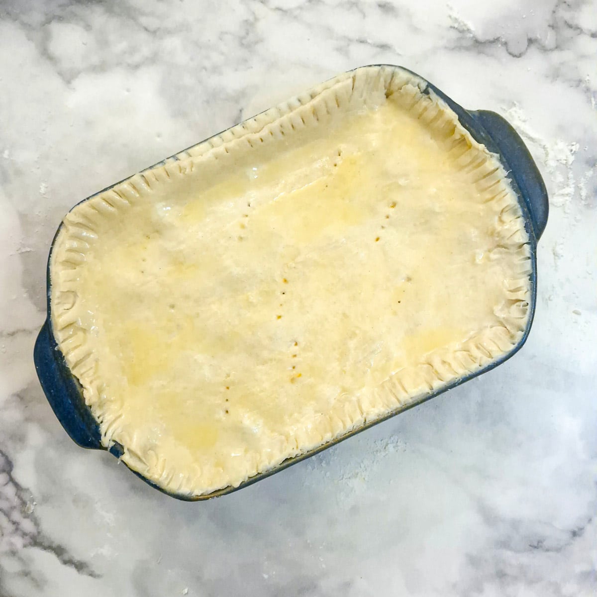 Pastry covering a meat pie.