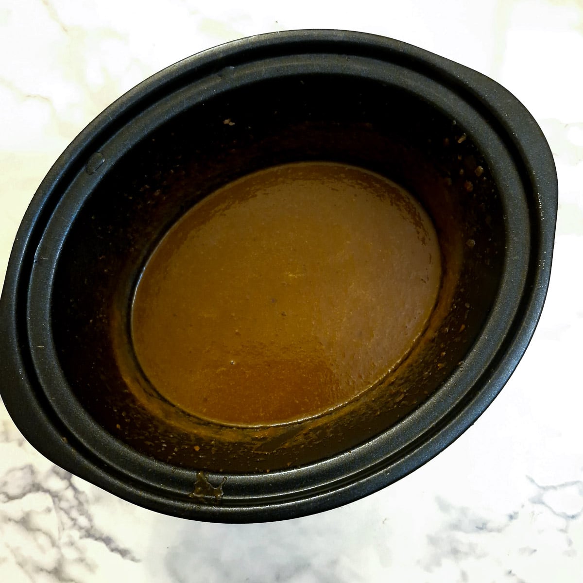Blended gravy in a slow cooker.