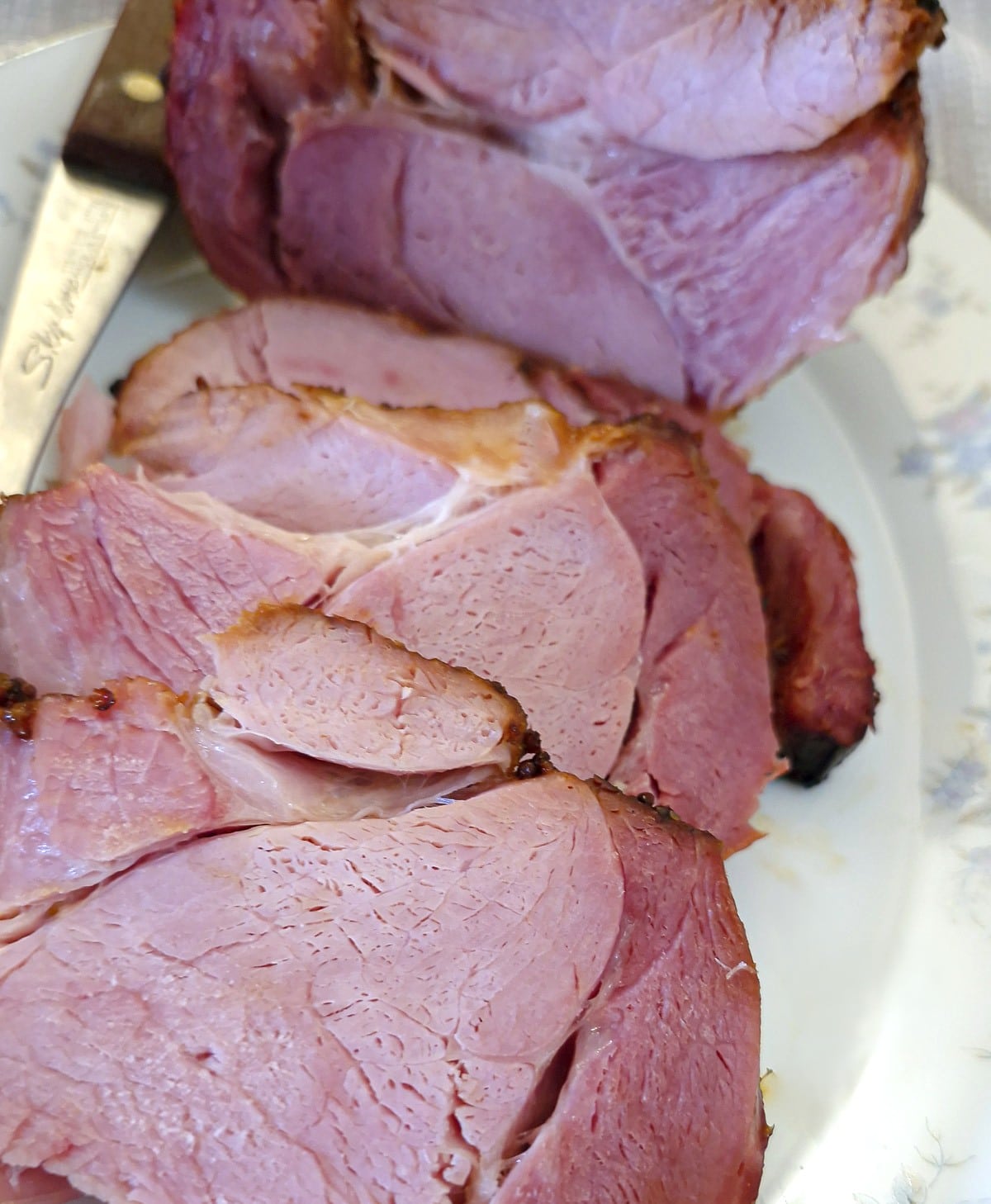 Close up of slices of cooked gammon.