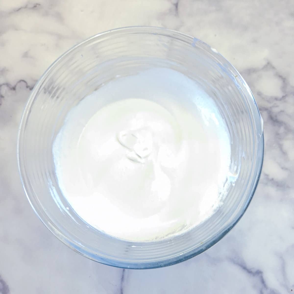 Thick, glossy egg whites after they have been beaten with sugar.
