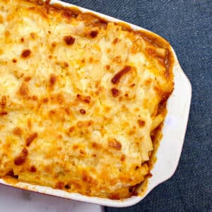 Overhead shot of a dish of macaroni and cheese lasagne.