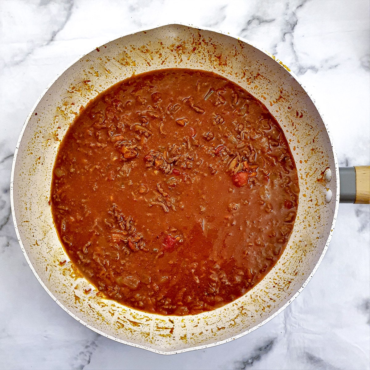 Step 4 - simmer the sauce for 1 to 1.5 hours.