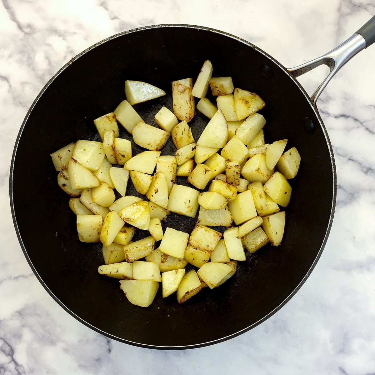Step 2, brown the potatoes.
