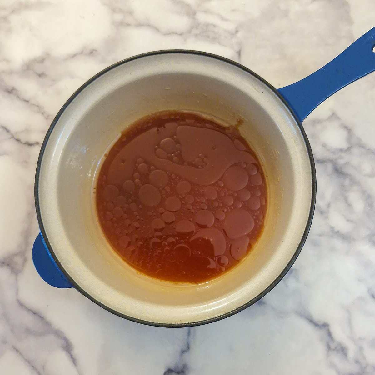 Marinade ingredients combined in a saucepan.