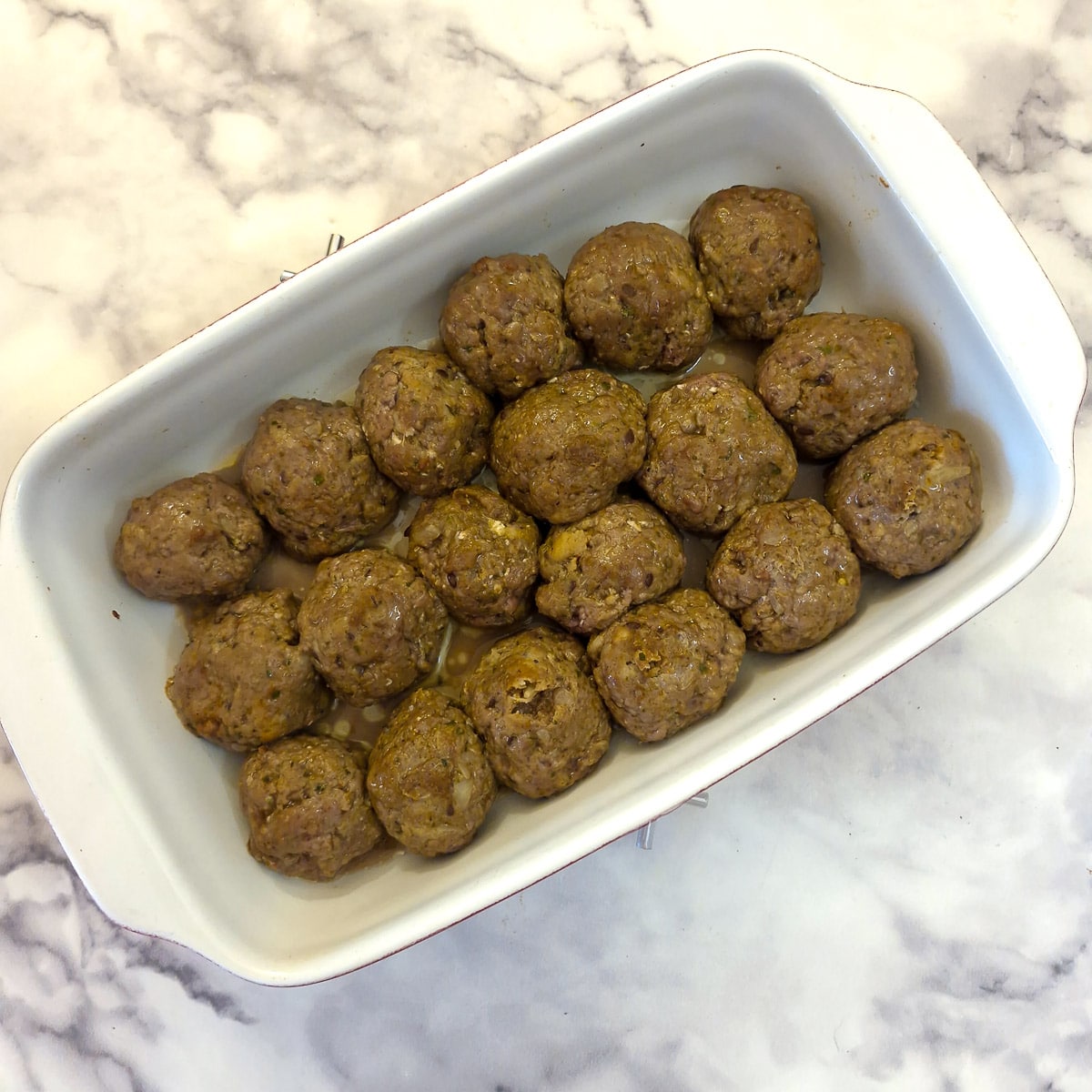 Step 4, meatballs in a casserole dish baked for 15 minutes.