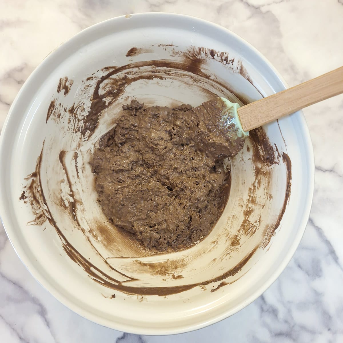 Step 2 - combine the ice cream and flour to form a thick, sticky cake batter.