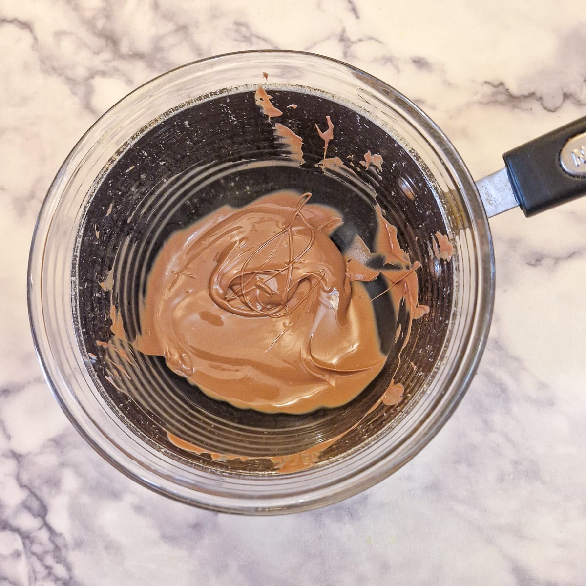 Step 6, melted chocolate in a glass bowl.