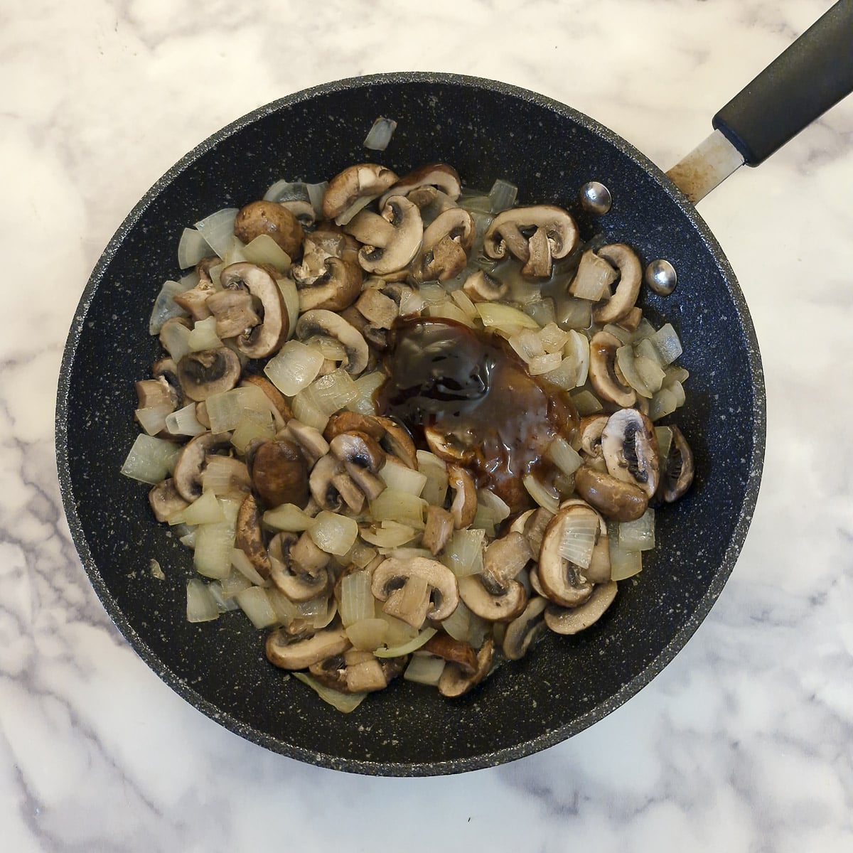 Chutney and oyster sauce added to the mushrooms and onions.