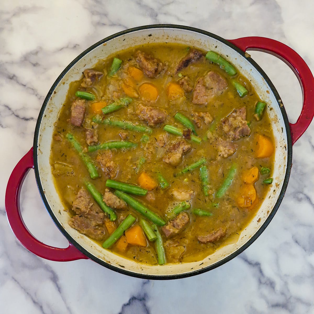 Green beans added to the pork casserole.