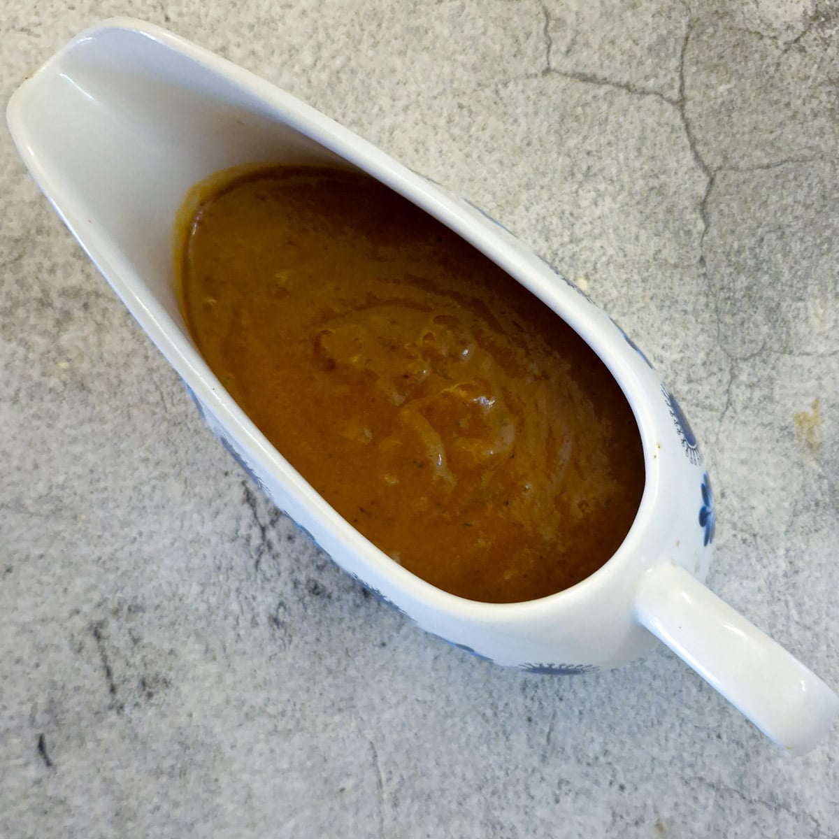 Smooth blended gravy in a gravy boat.