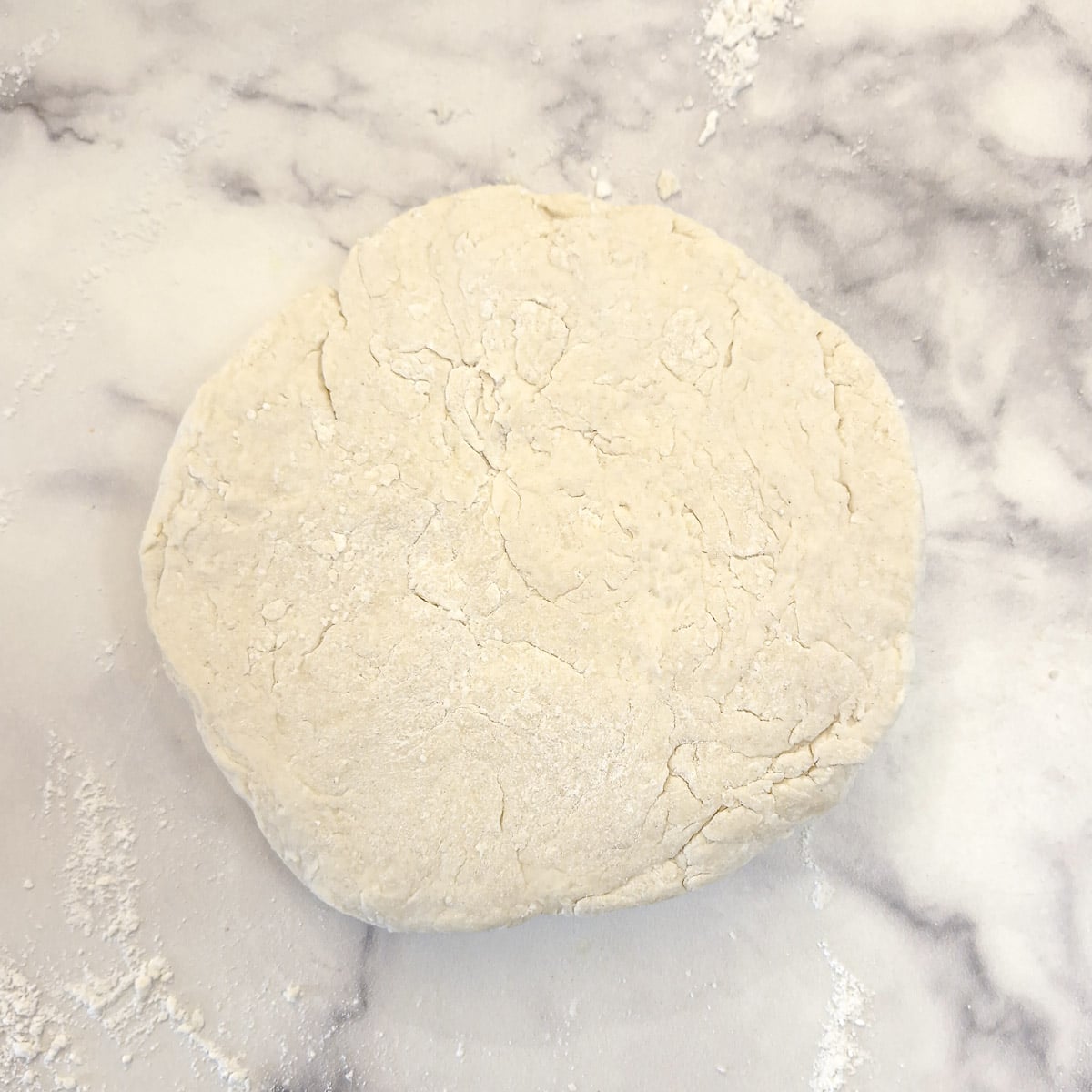 Step 4 - press the dough together to form a smooth ball.
