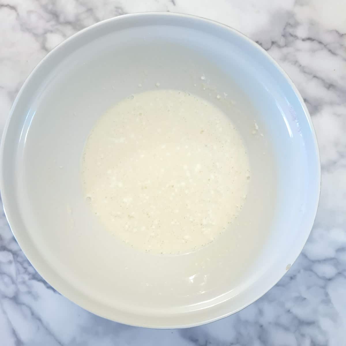 Milk and flour combined with the egg and cream cheese mixture.