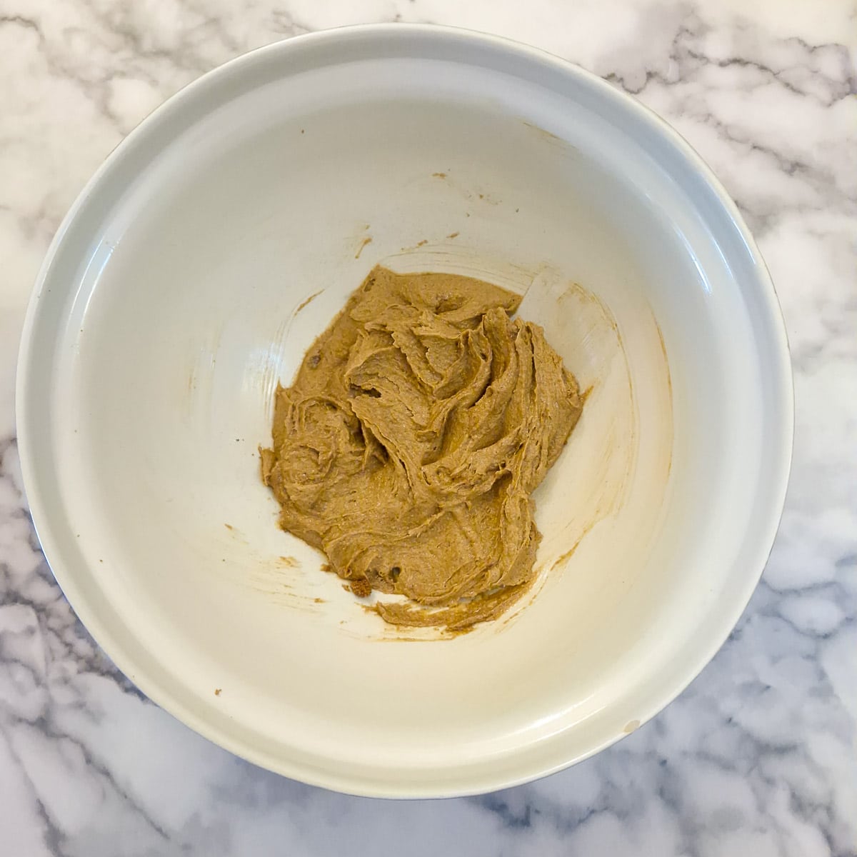Step 1, brown sugar and butterr creamed in a mixing bowl.