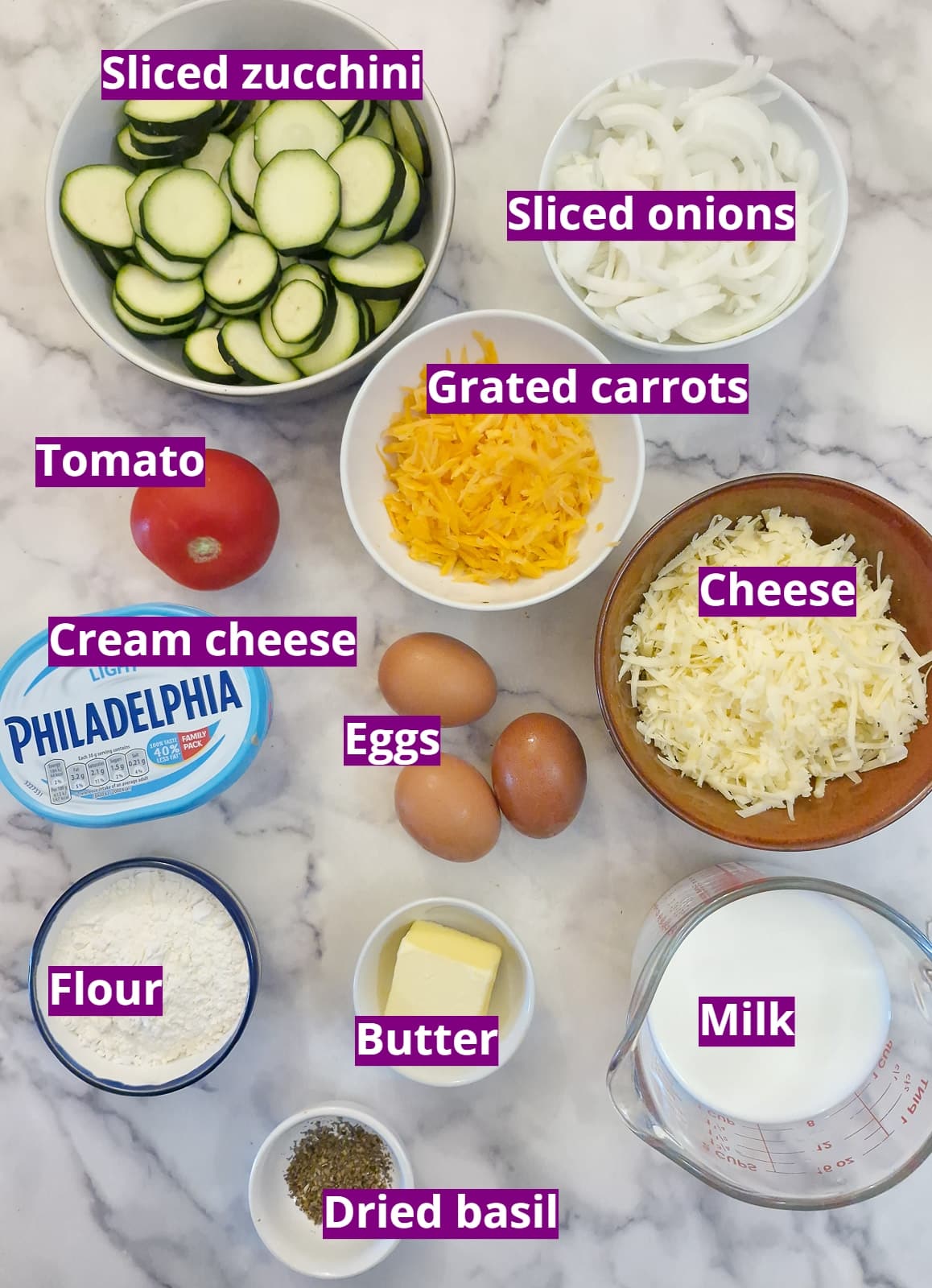 Ingredients you will nee to make a crustless zucchini and carrot quiche.