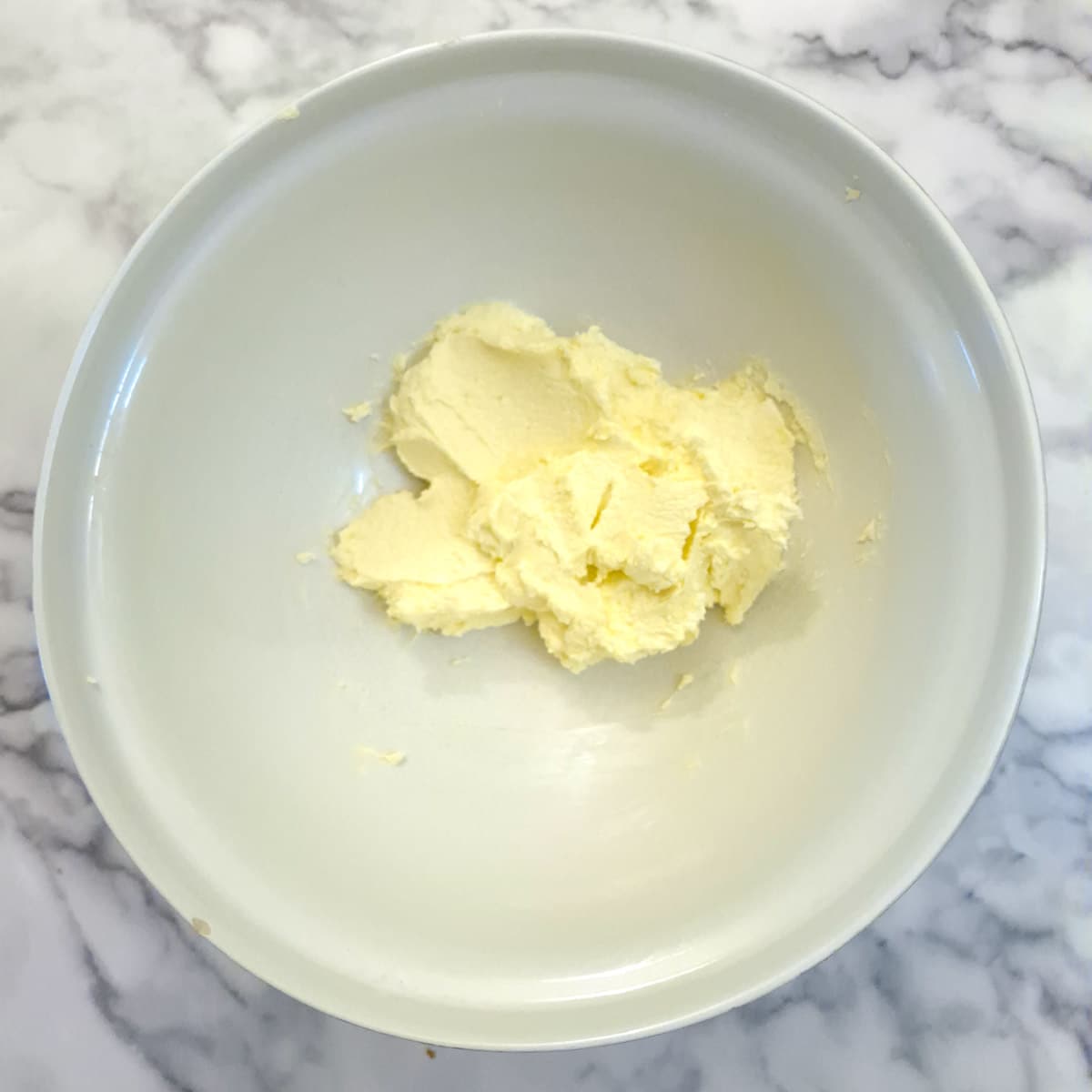 Step 1, cream butter and sugar in a mixing bowl.