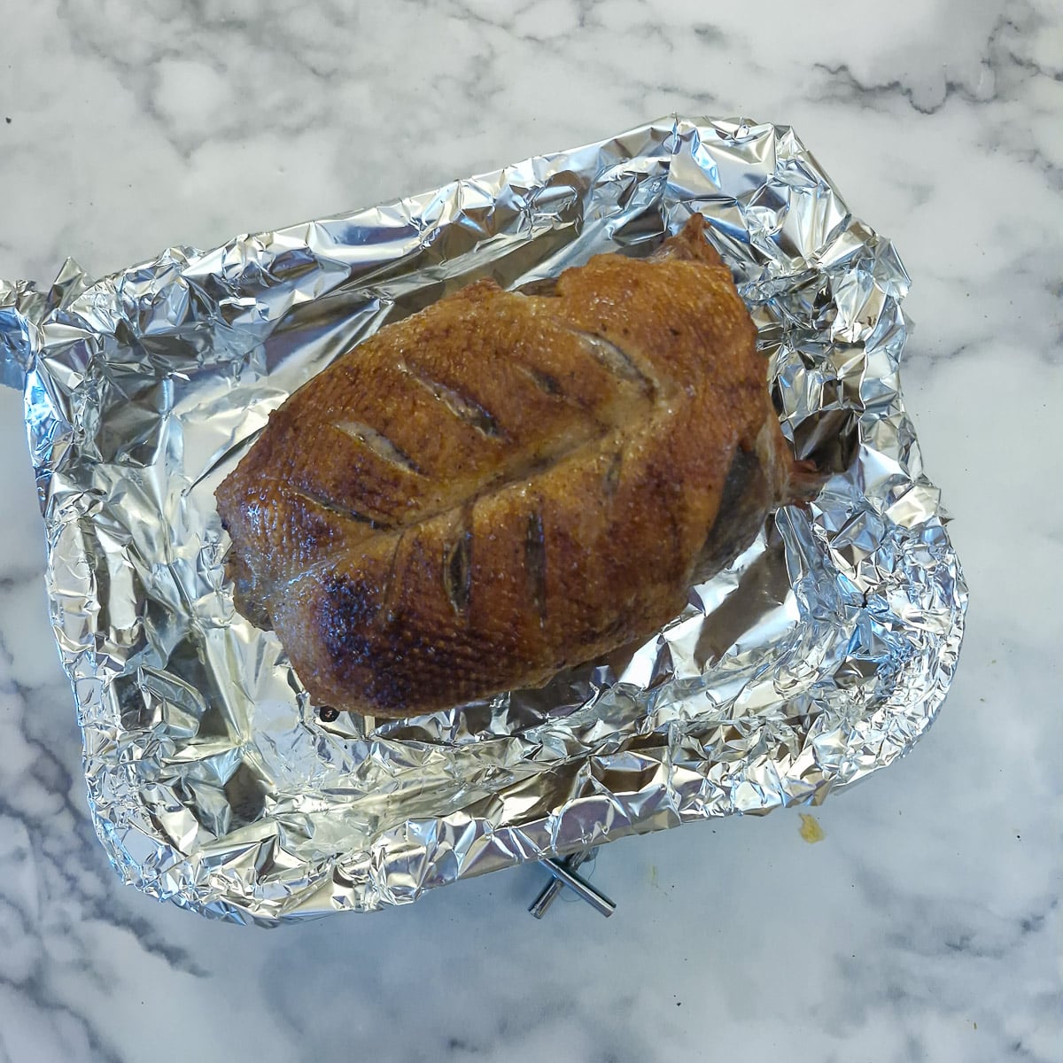 Duck crown that has been crisped in the oven.