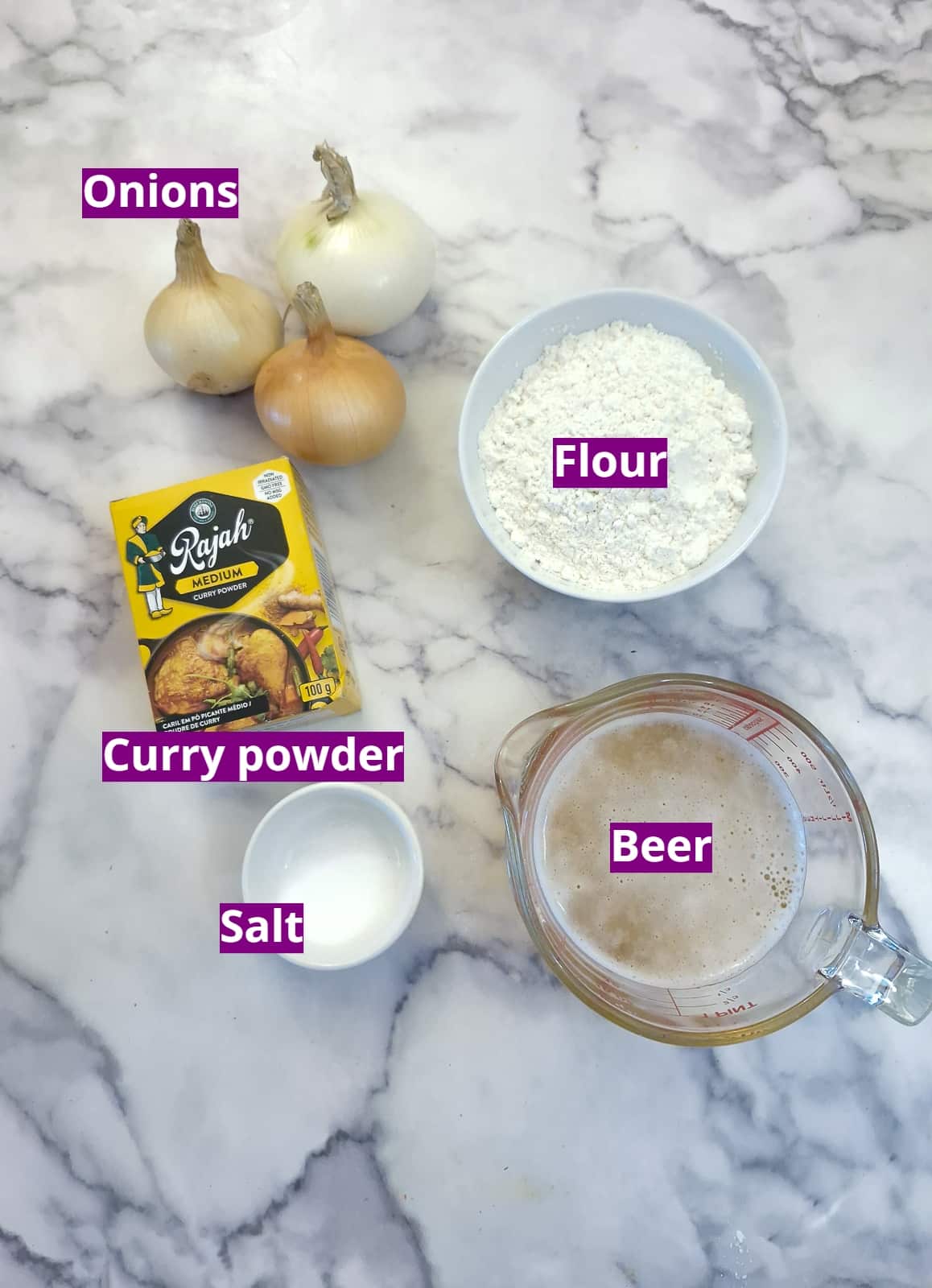 Ingredients you will need to make crispy beer battered onion fritters.