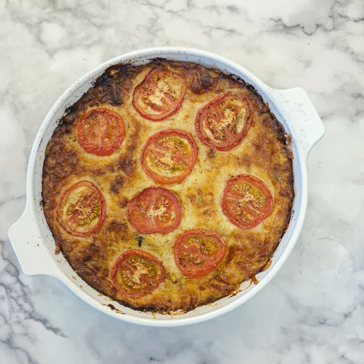 A fully baked mortadella quiche.