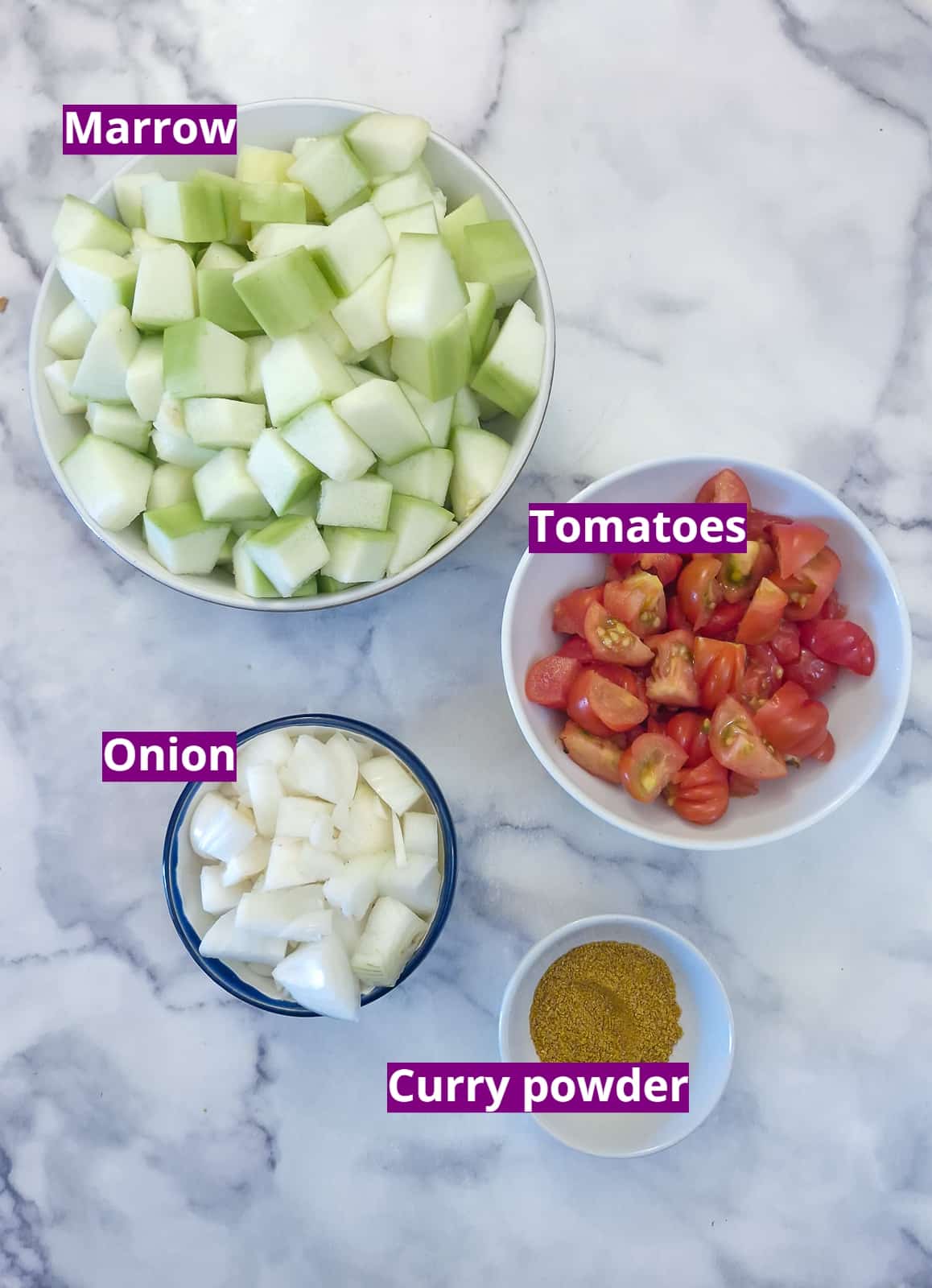 Ingredients for braised marrow with tomato and onion.