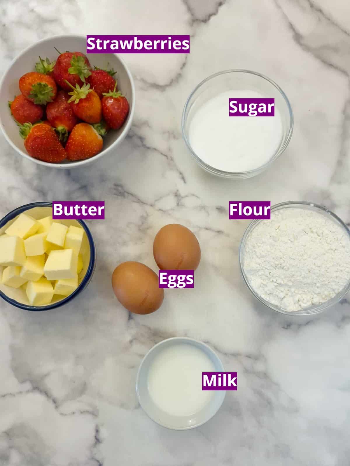 Ingredients for making a microwave strawberry sponge pudding.