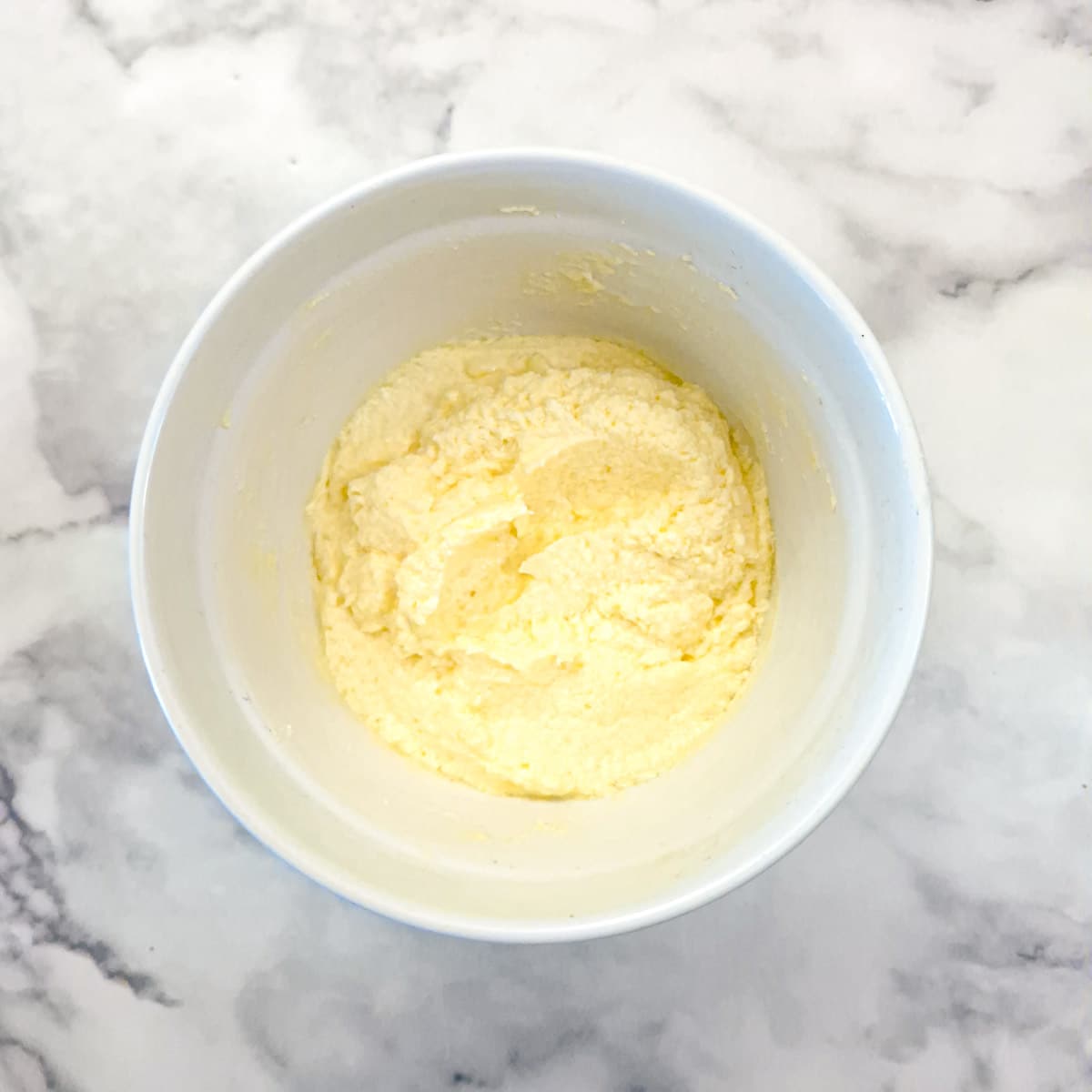 The sponge batter with eggs beaten in.