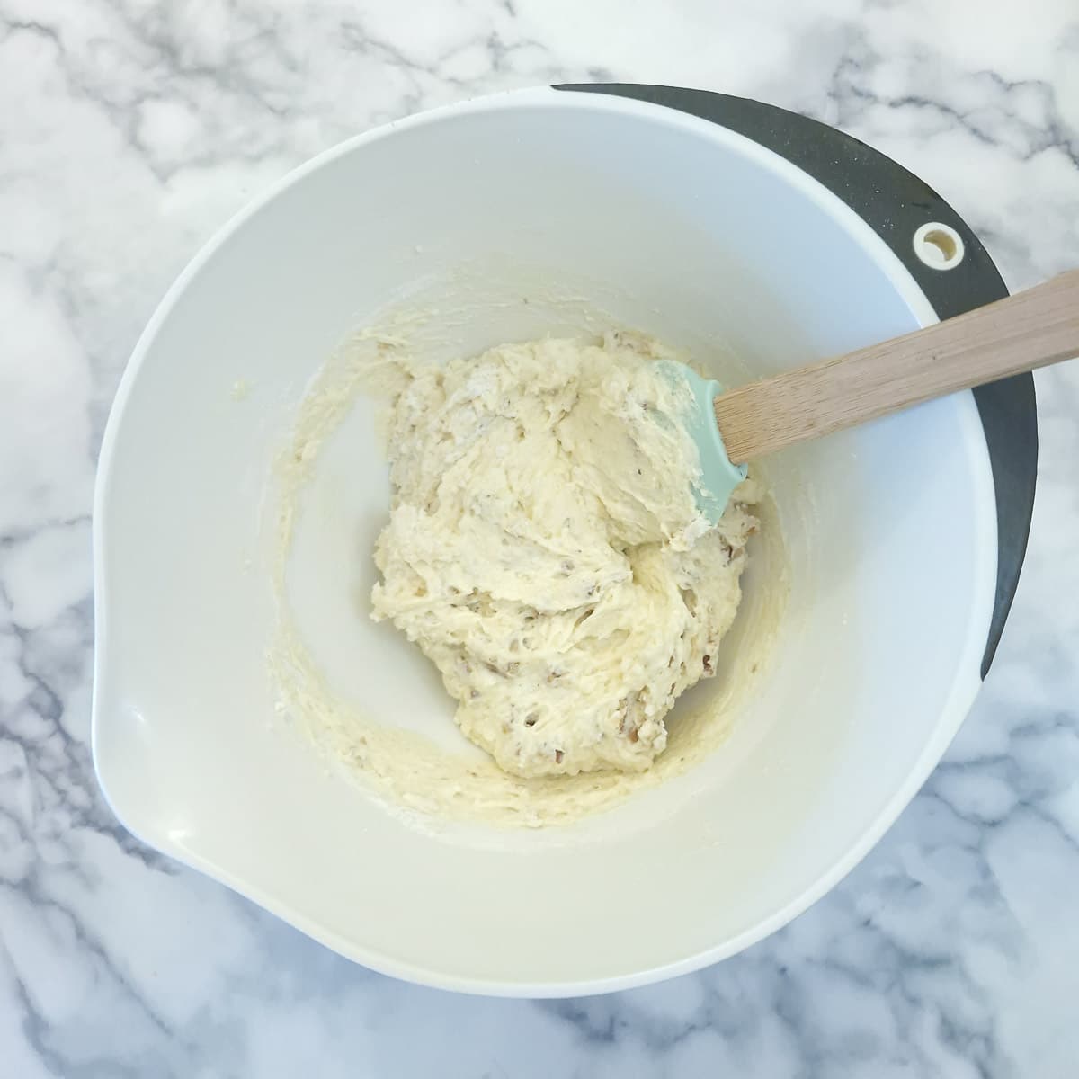 Step 4, chopped walnuts folded into the orange drizzle cake mixtue.