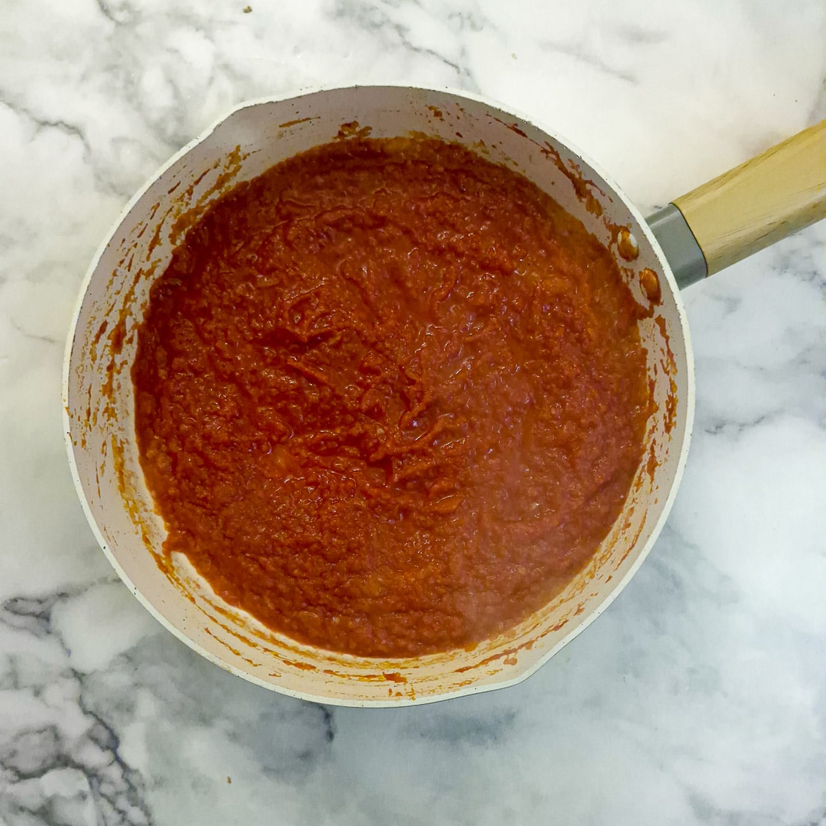 Passaata added to the red peppers and onions.