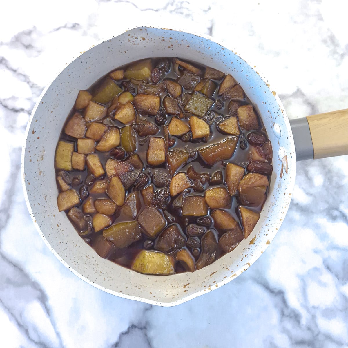 Step 3, marrow chutney ingredients simmering in a saucepan.