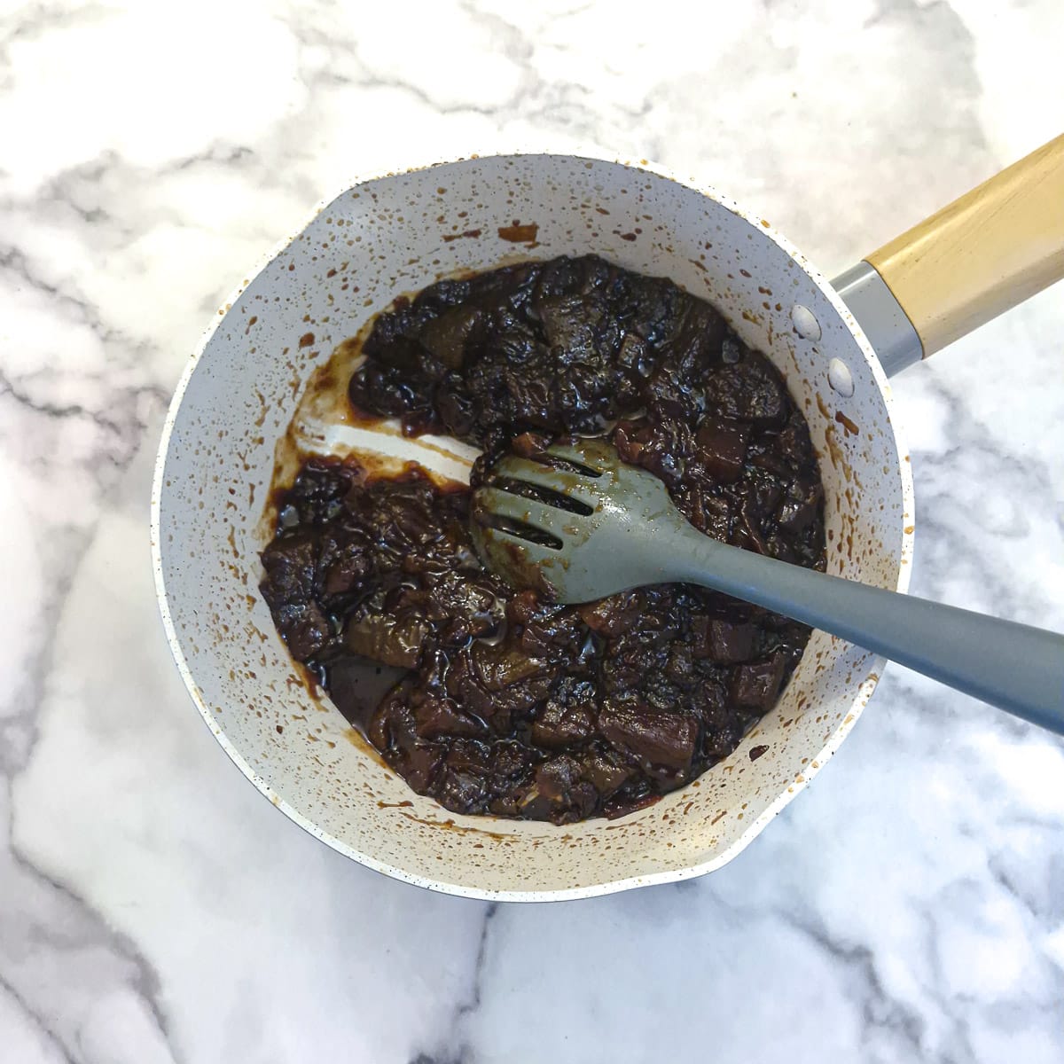 Step 4, thickened marrow and apple chutney in a saucepan.