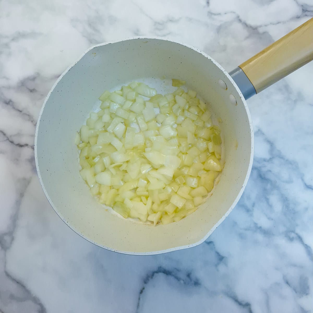 Step 1, onions softening in oil in a saucepan.