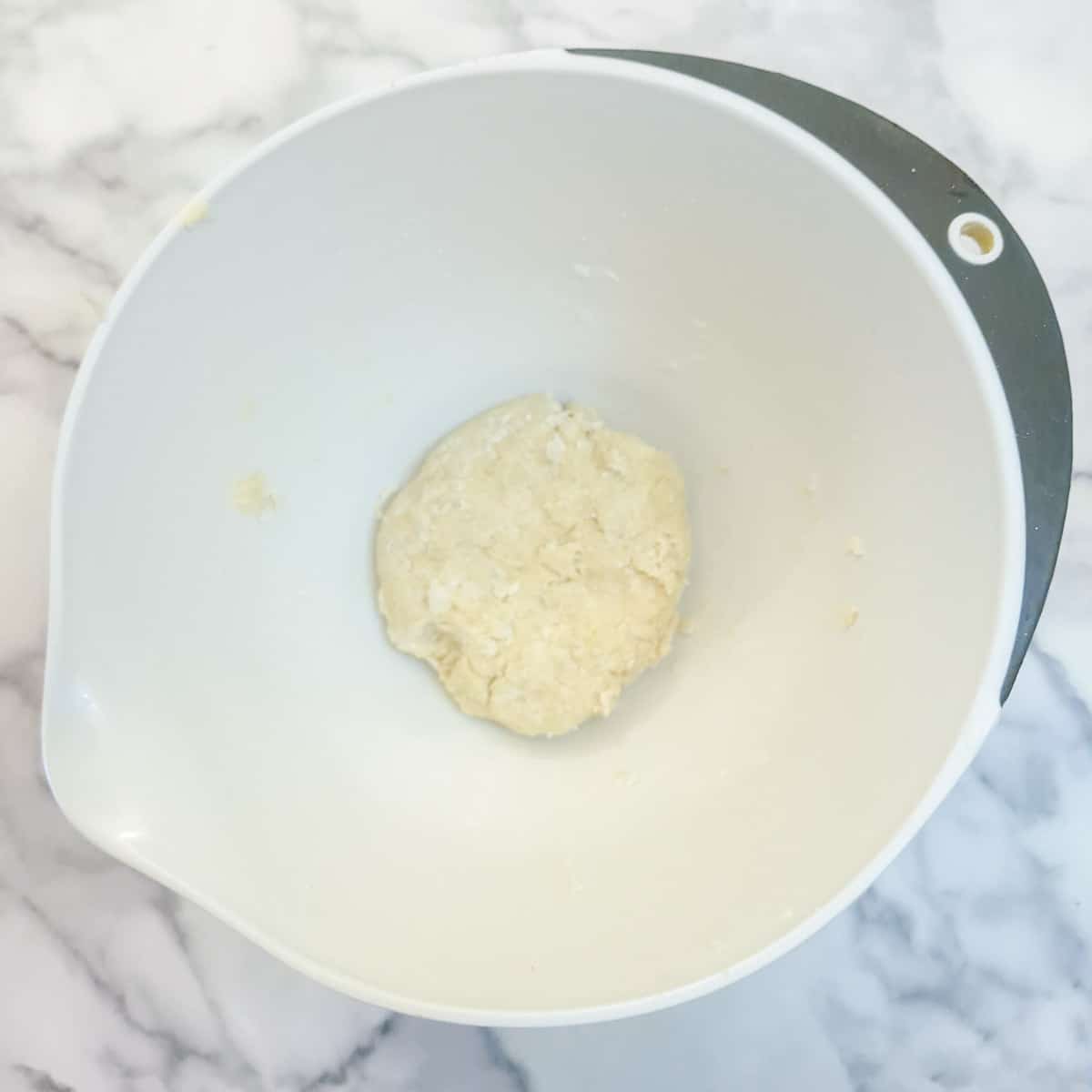 Step 2, a ball of cream cheese pastry in a mixing bowl.