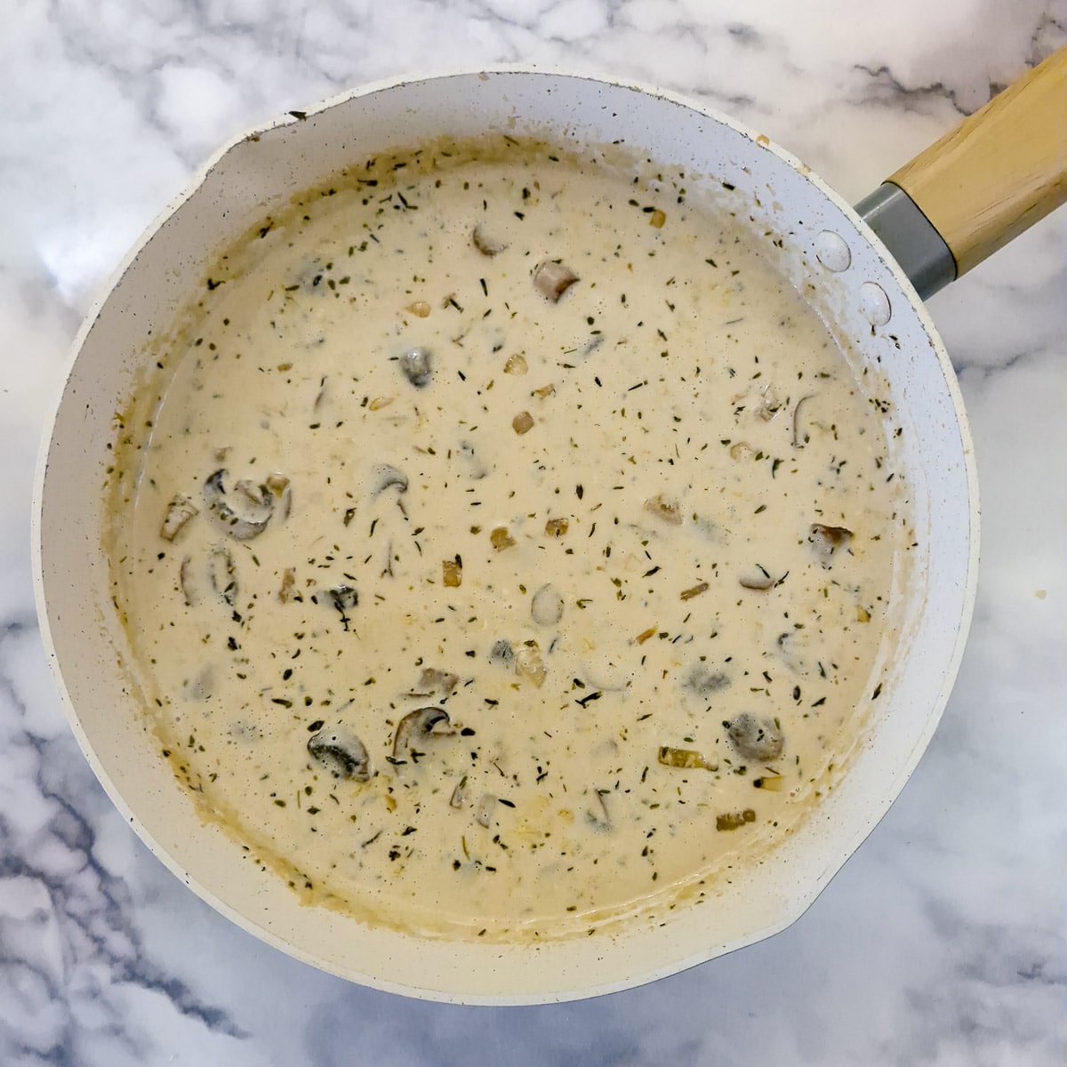 Step 12, cream mixed into the sauce.