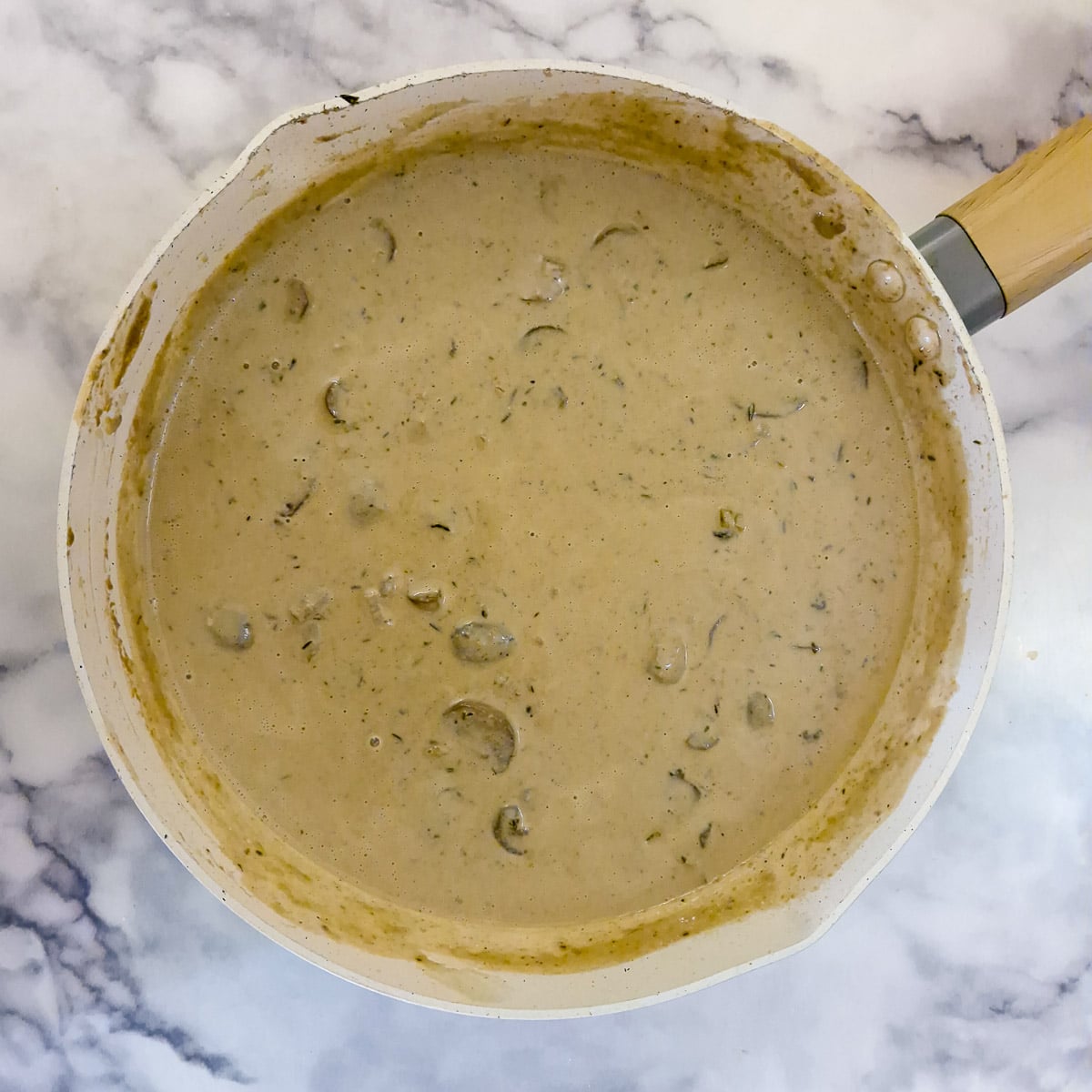 Step 13, the final step in making the sauce, with the pate stirred in to thicken it.