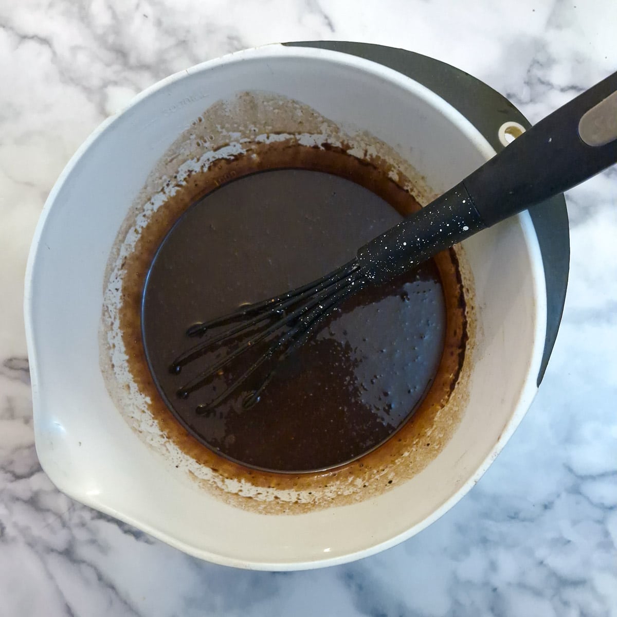 Step 6, boiling water stirred into the cake batter.