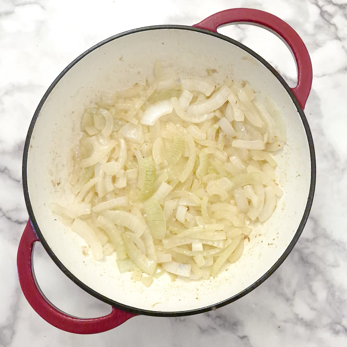 Step 3, onions softening in a casserole dish.