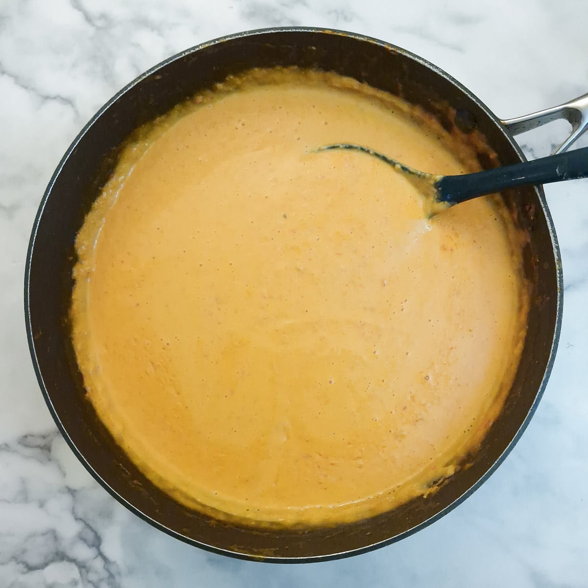 Step 7, thickened sauce with cream and cheese mixed in.