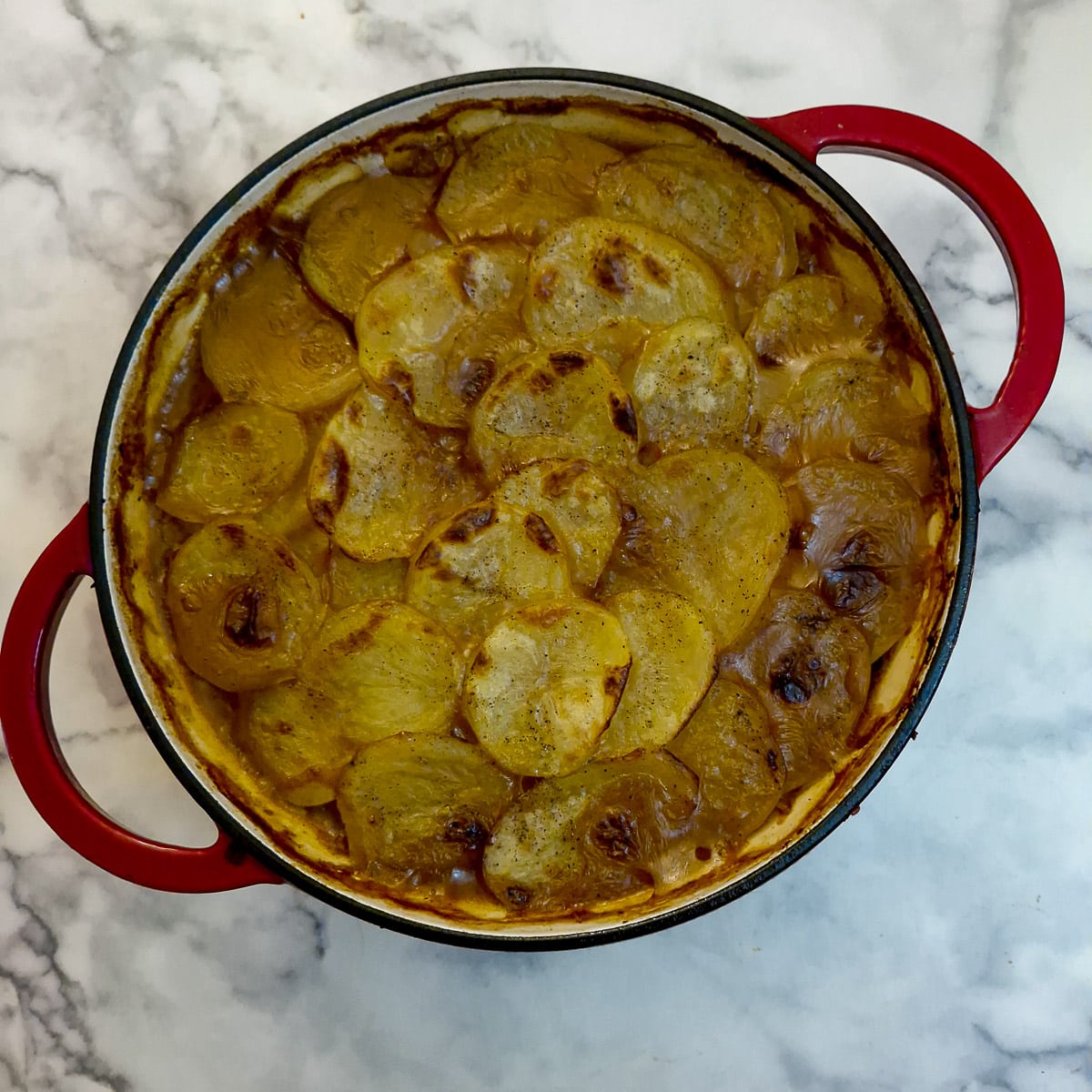 Step 11, the final hotpot with crispy potatoes on top.