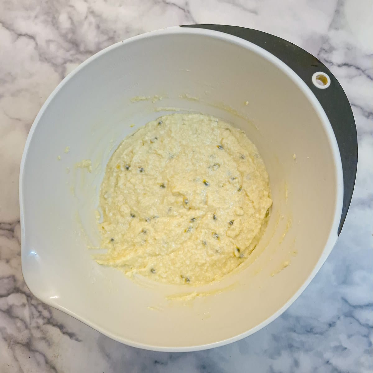 Flour coconut and milk added to the batter.