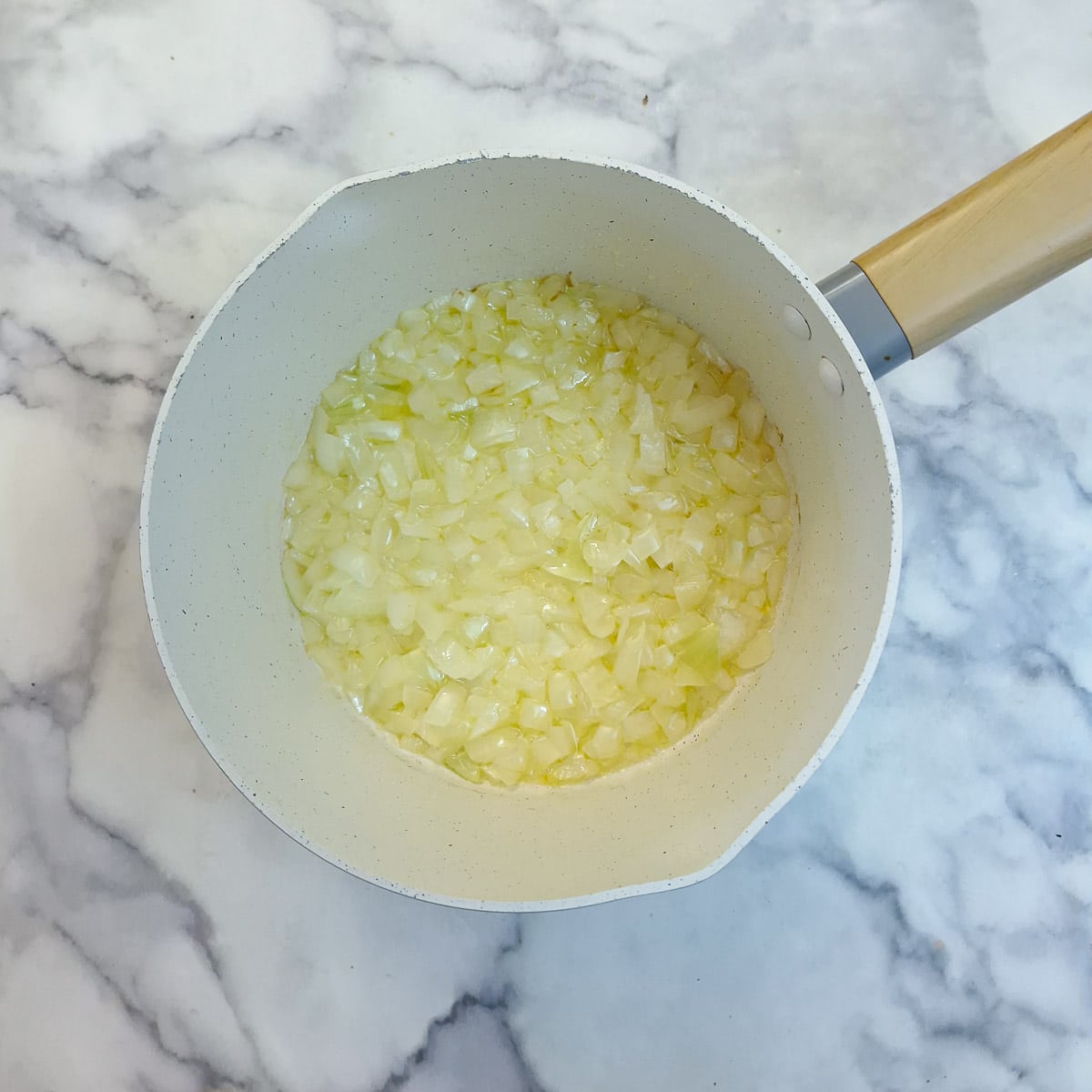 Step 1 - onions softening in olive oil in a saucepan.