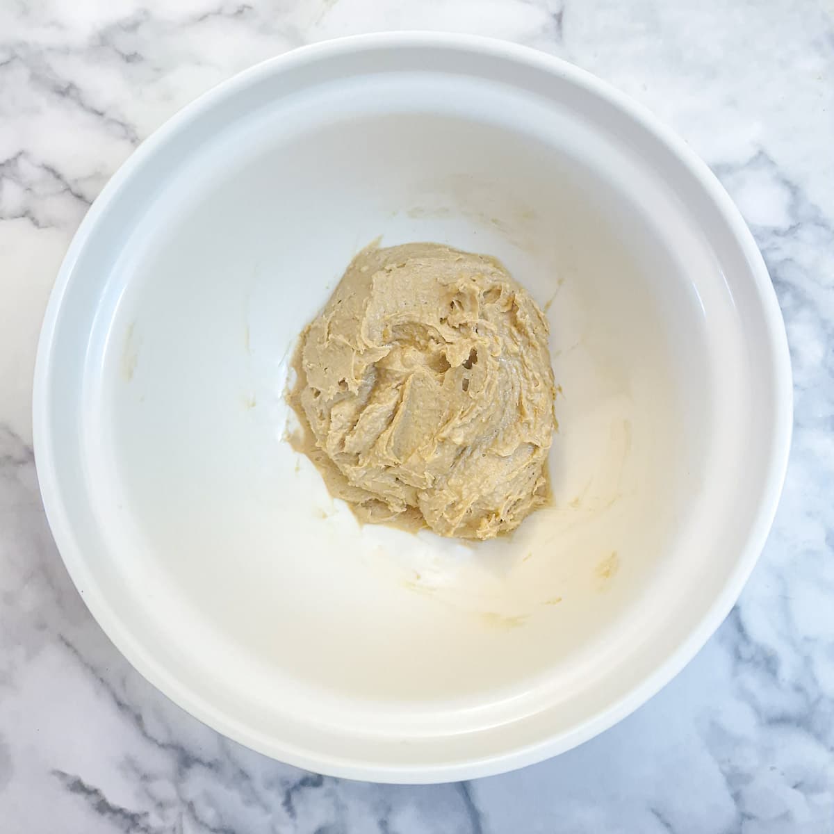 Step 1 - sugar, biscoff and butter creamed in a mixing bowl.