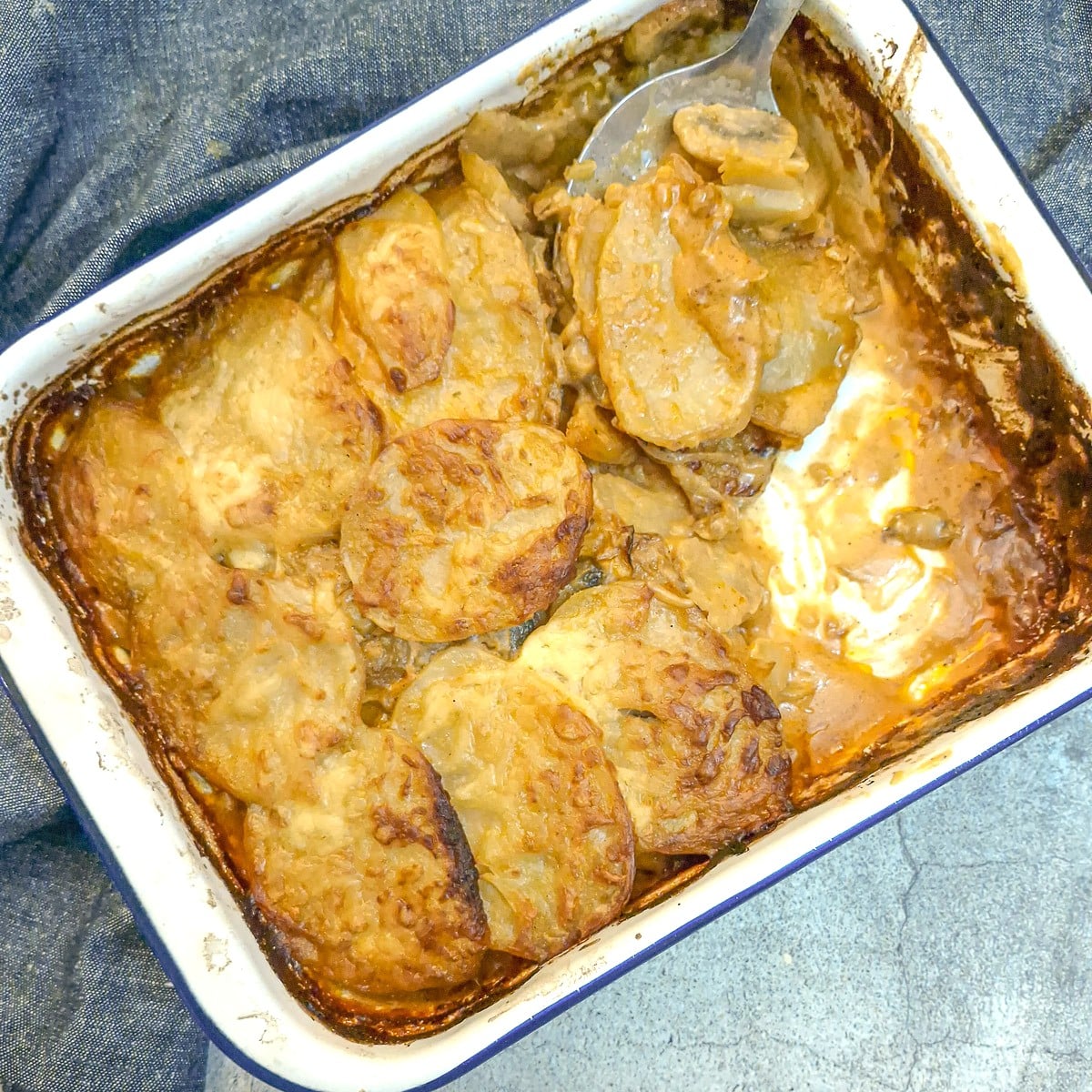 Close up of the crispy potatoes on top of the potato bake.