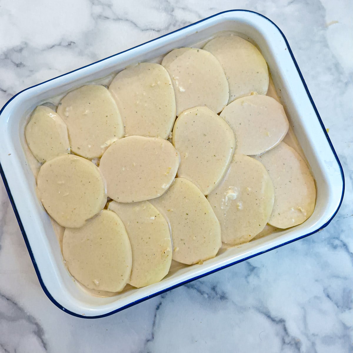 Step 6 - the sauce poured over the potatoes.