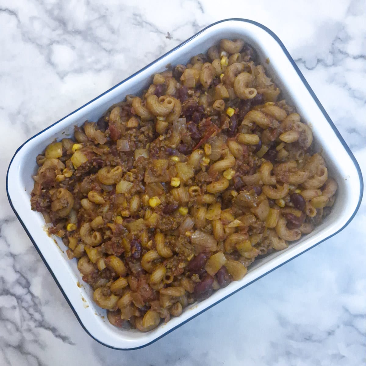 The chille con carne traqnsferred to a baking dish.