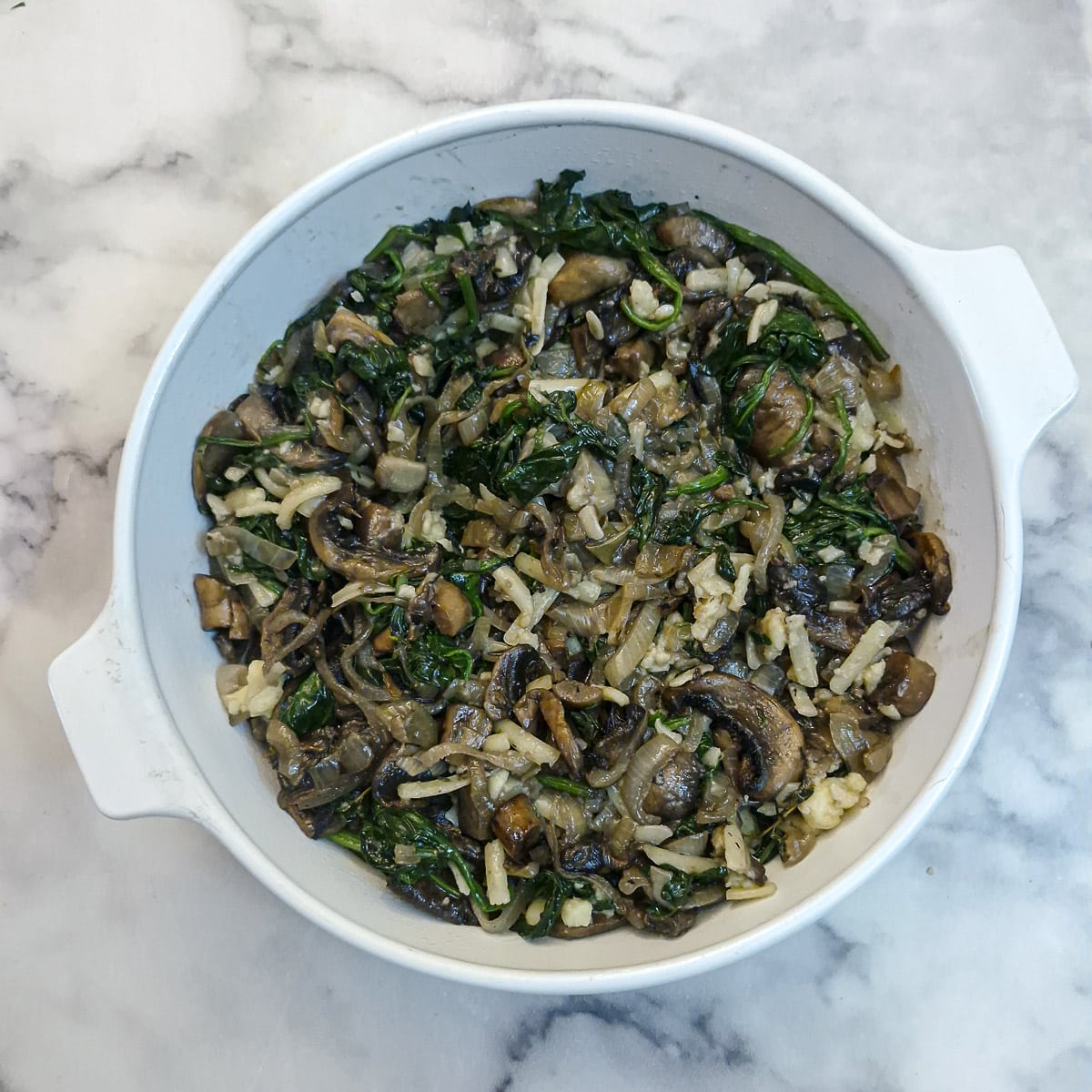 The filling transferred from the frying pan into a 9 inch diameter baking dish.