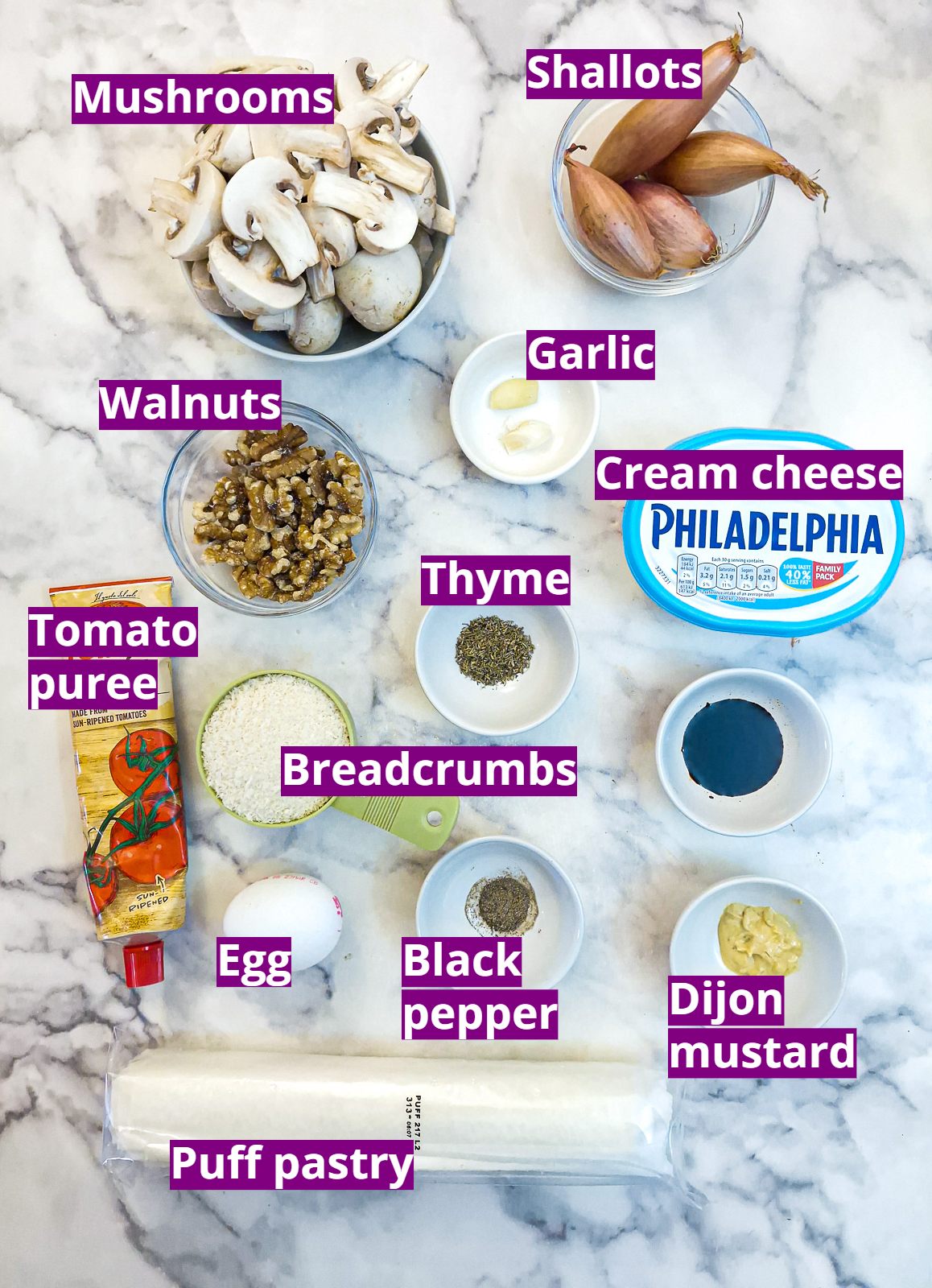 Ingredients needed for making mushroom sausage rolls with puff pastry.