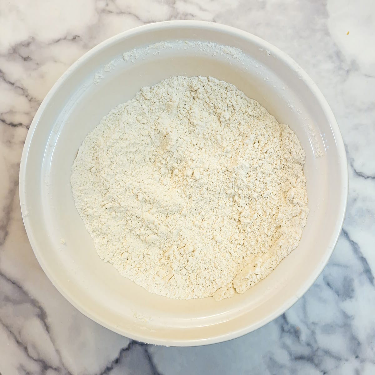 Margarine and butter rubbed together to form 'breadcrumbs'.